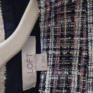 A LOFT size 2 skirt. The colors make it interesting. It has navy, white and pink